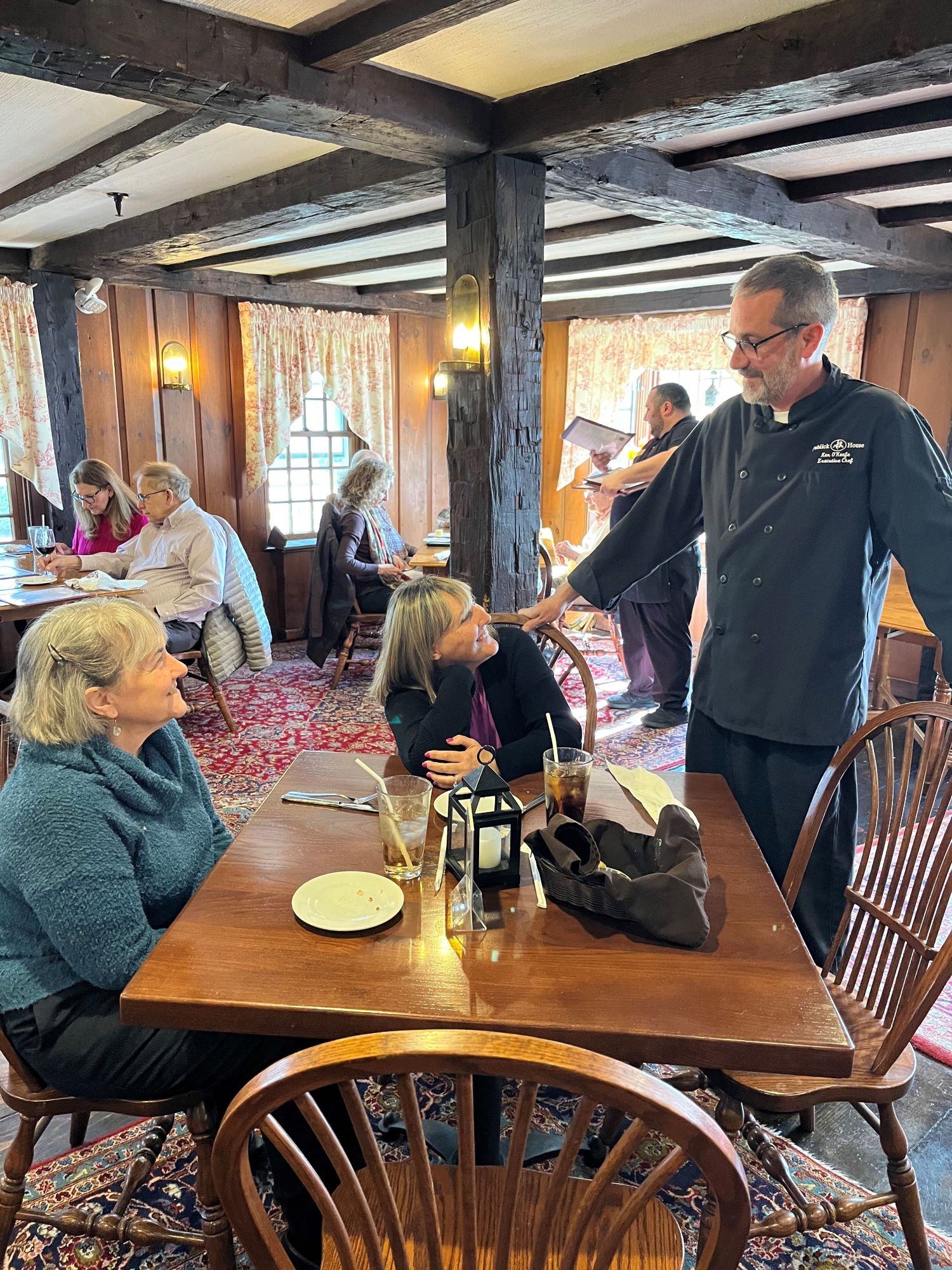 Chef Ken visits with patrons at the Publick House in Sturbridge, Massachusetts